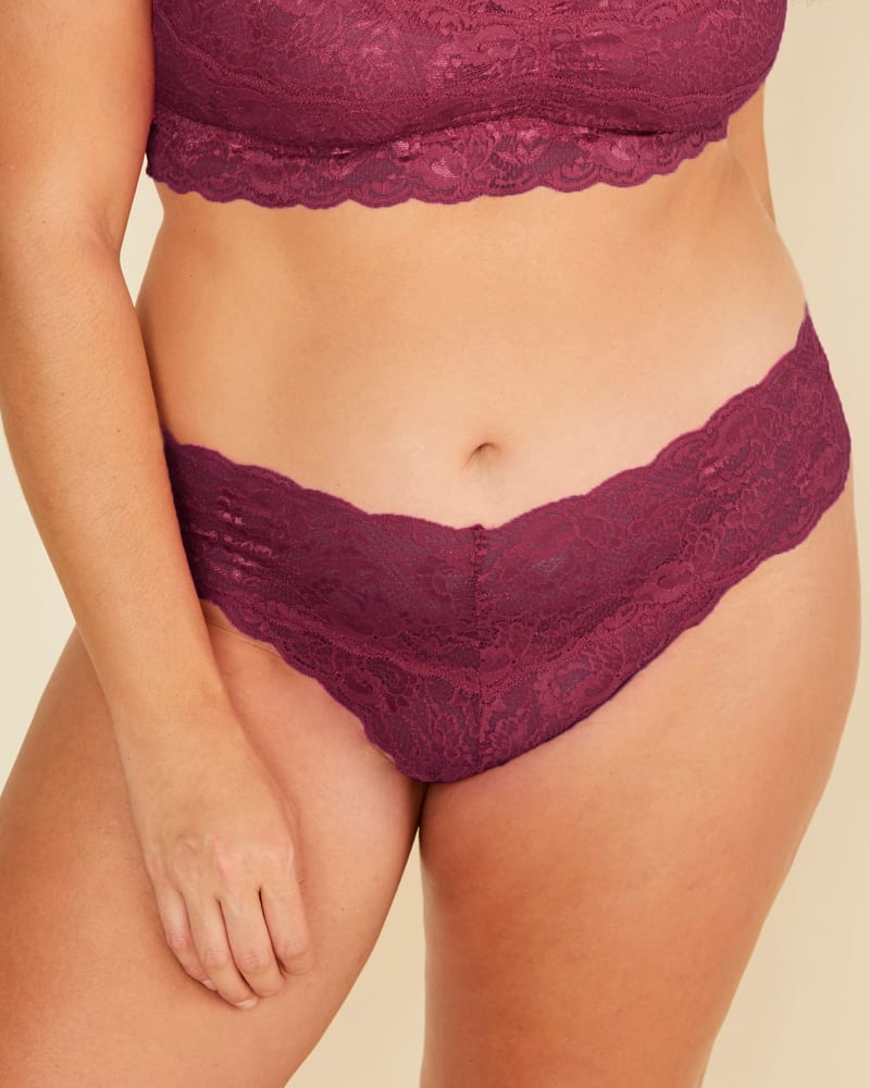 Front of a model wearing a size 1X Cutie Low Rise Thong in Vino by Cosabella. | dia_product_style_image_id:273573